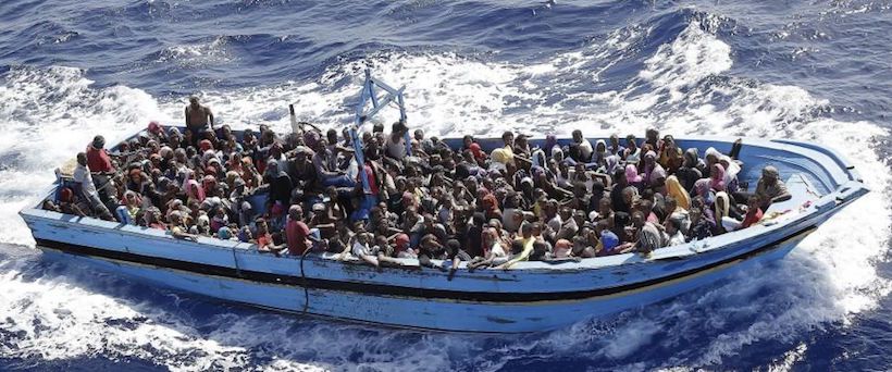 migranti in barca