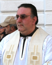 padre Enrico Ronzini, priore e parroco della Basilica minore del Carmine